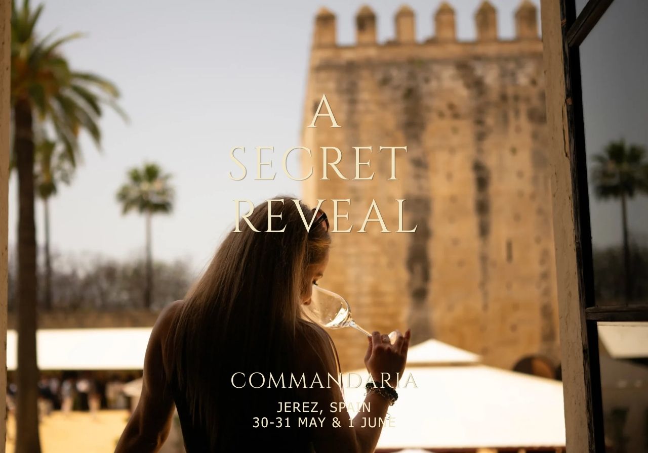 Theatrical reveal of a Commandaria bottle